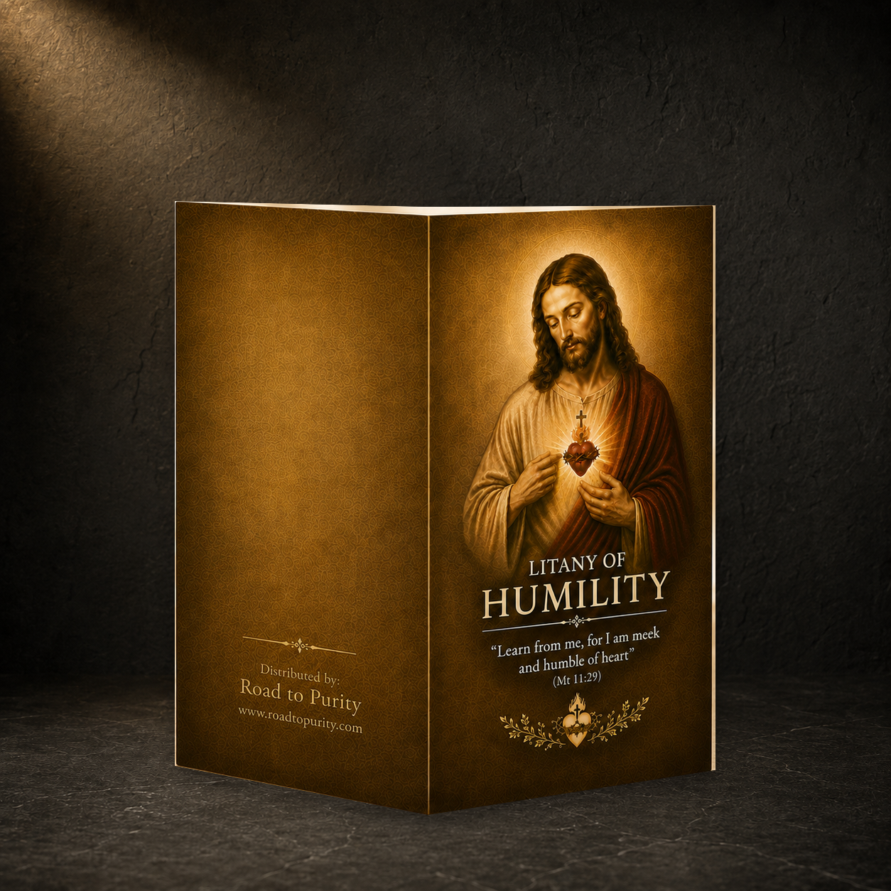 Litany of Humility prayer card in a dark premium devotional setting