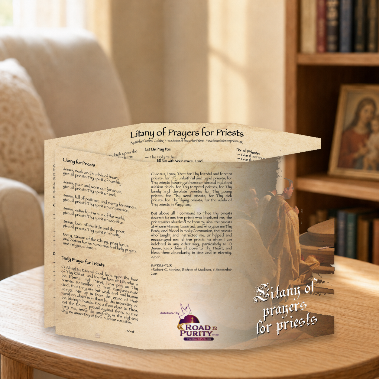 Litany of Prayers for Priests prayer card displayed in a warm Catholic reading area